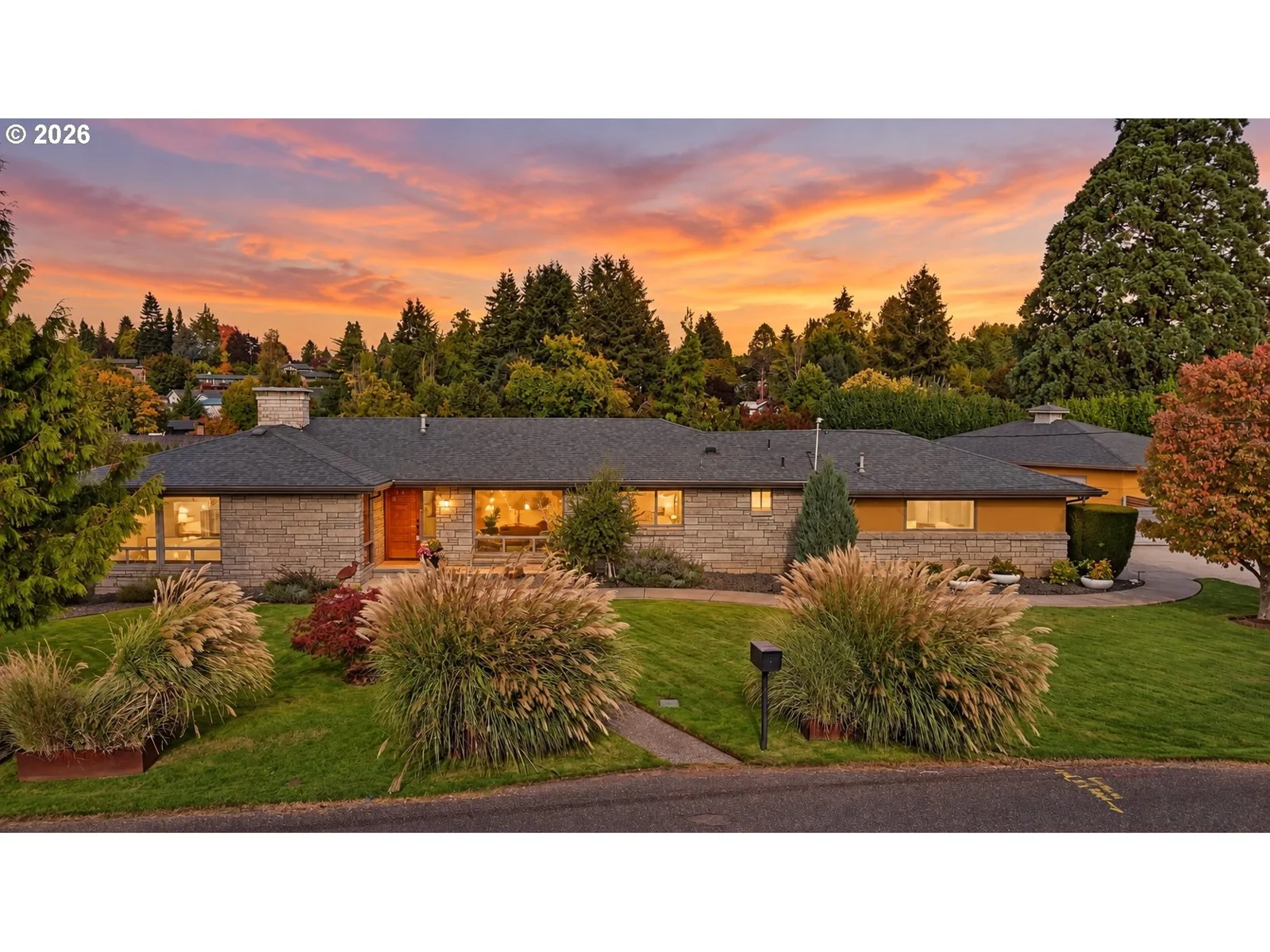 Front exterior and landscaped approach