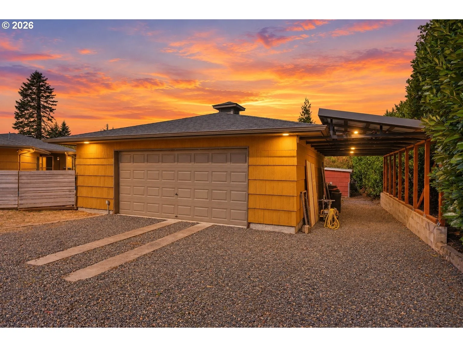 Detached garage and side carport